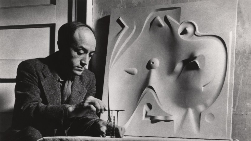 picutre of noguchi working on art piece